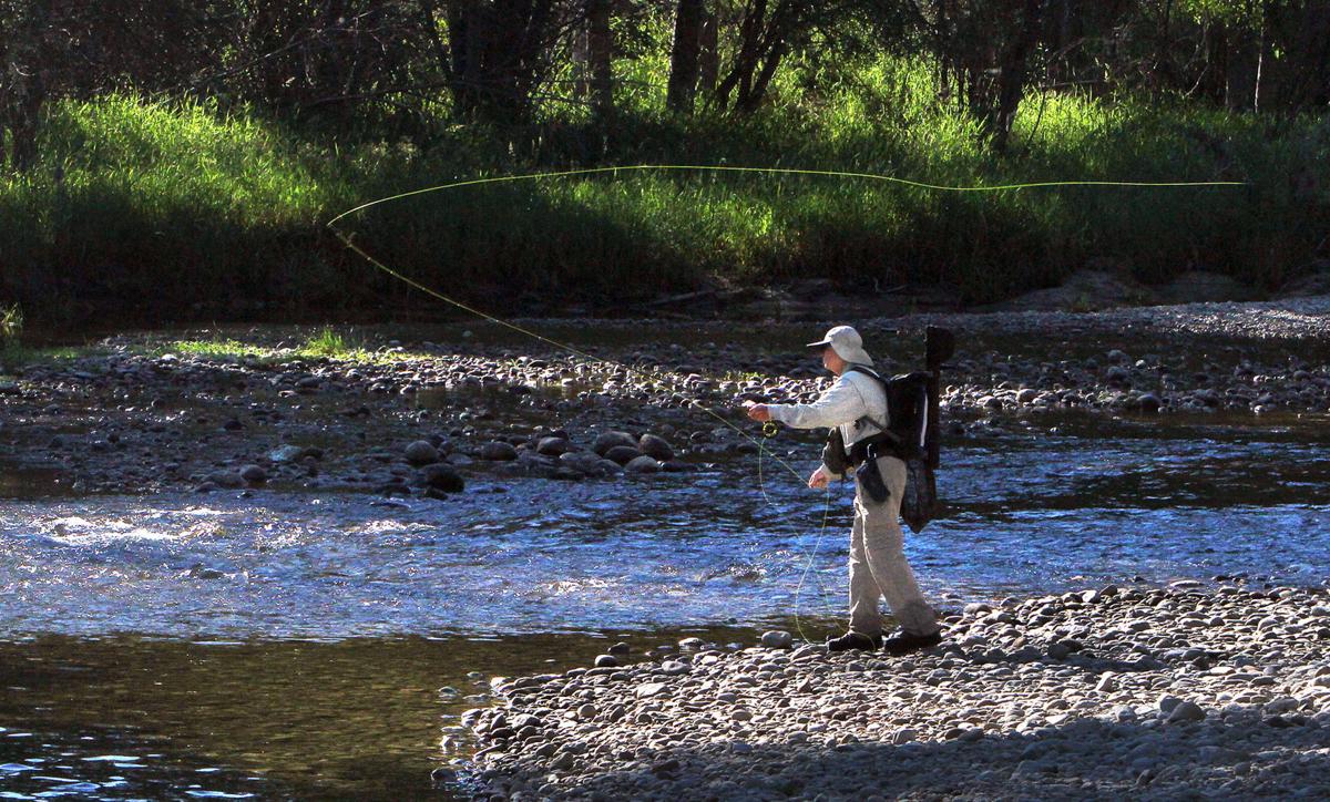 The Slip-and-Grab Fish Landing Technique - Fly Fisherman