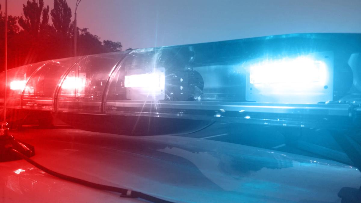 Emergency vehicle lights flashing, police car inspecting city, security service (copy)