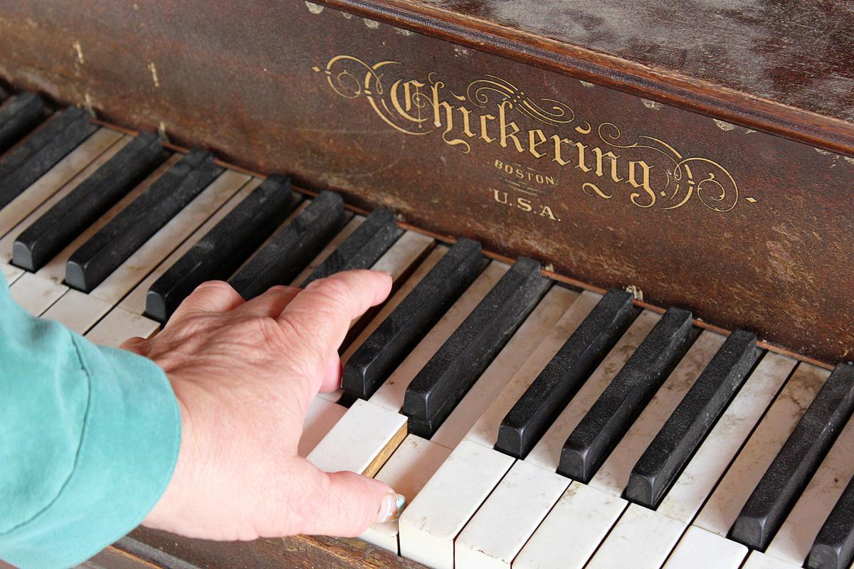 Darby Piano hand on keys