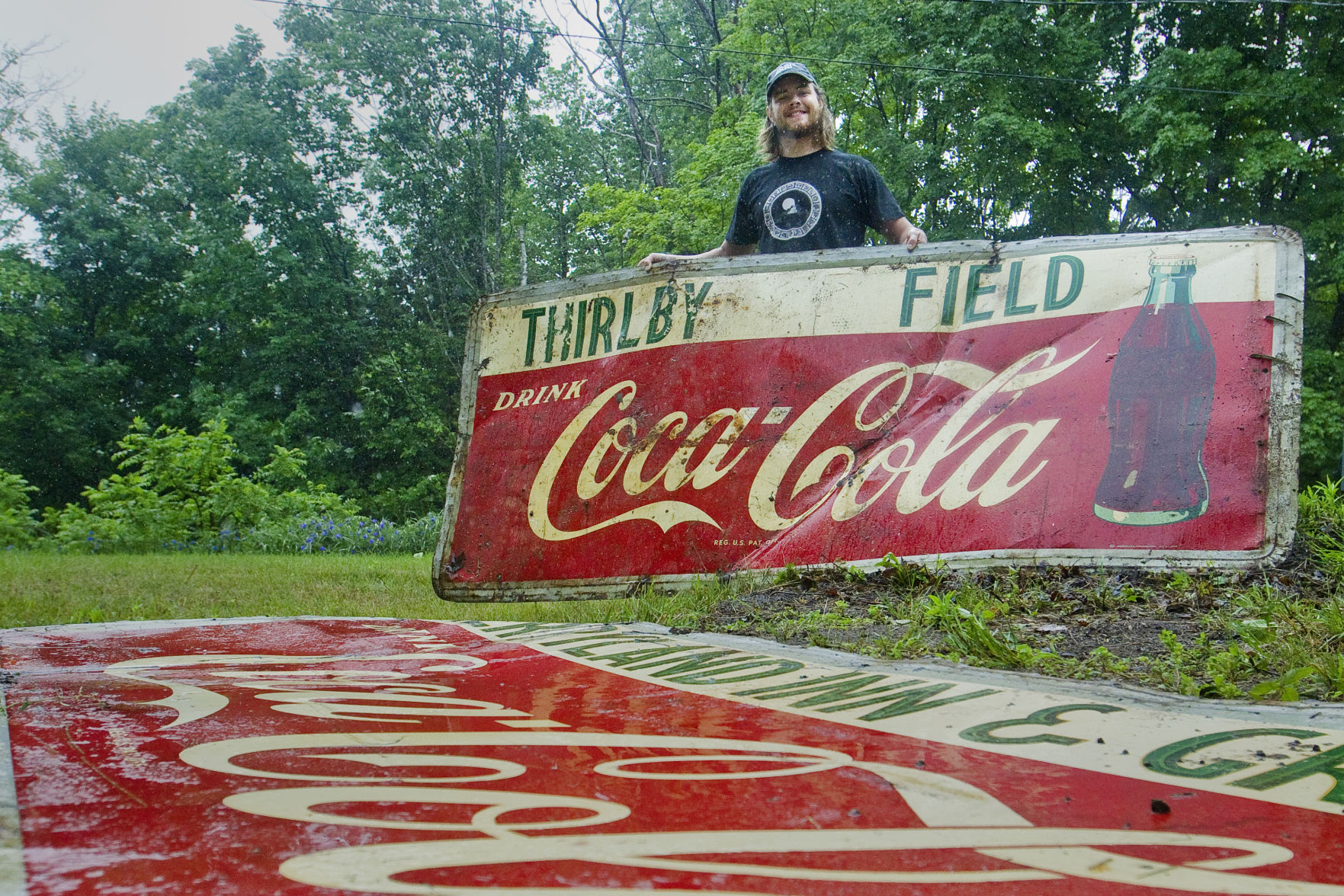 Refreshing & Delicious: Vintage Coca Cola signs found on Maple