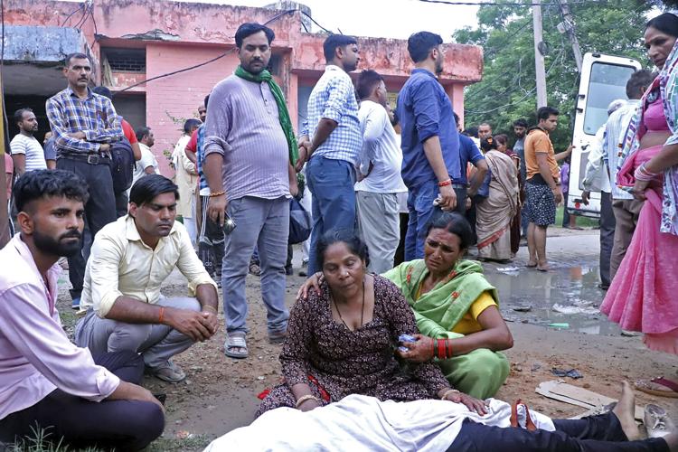 Stampede at religious event in India kills more than 100 ...