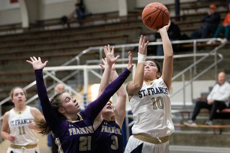 Prep Roundup: Traverse City St. Francis girls basketball continues hot  start, moves to 4-0; TC West hockey gets second straight win, Sports