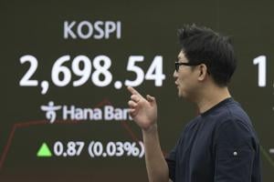 Wall Street drifts lower as oil prices jump and US manufacturing slumps