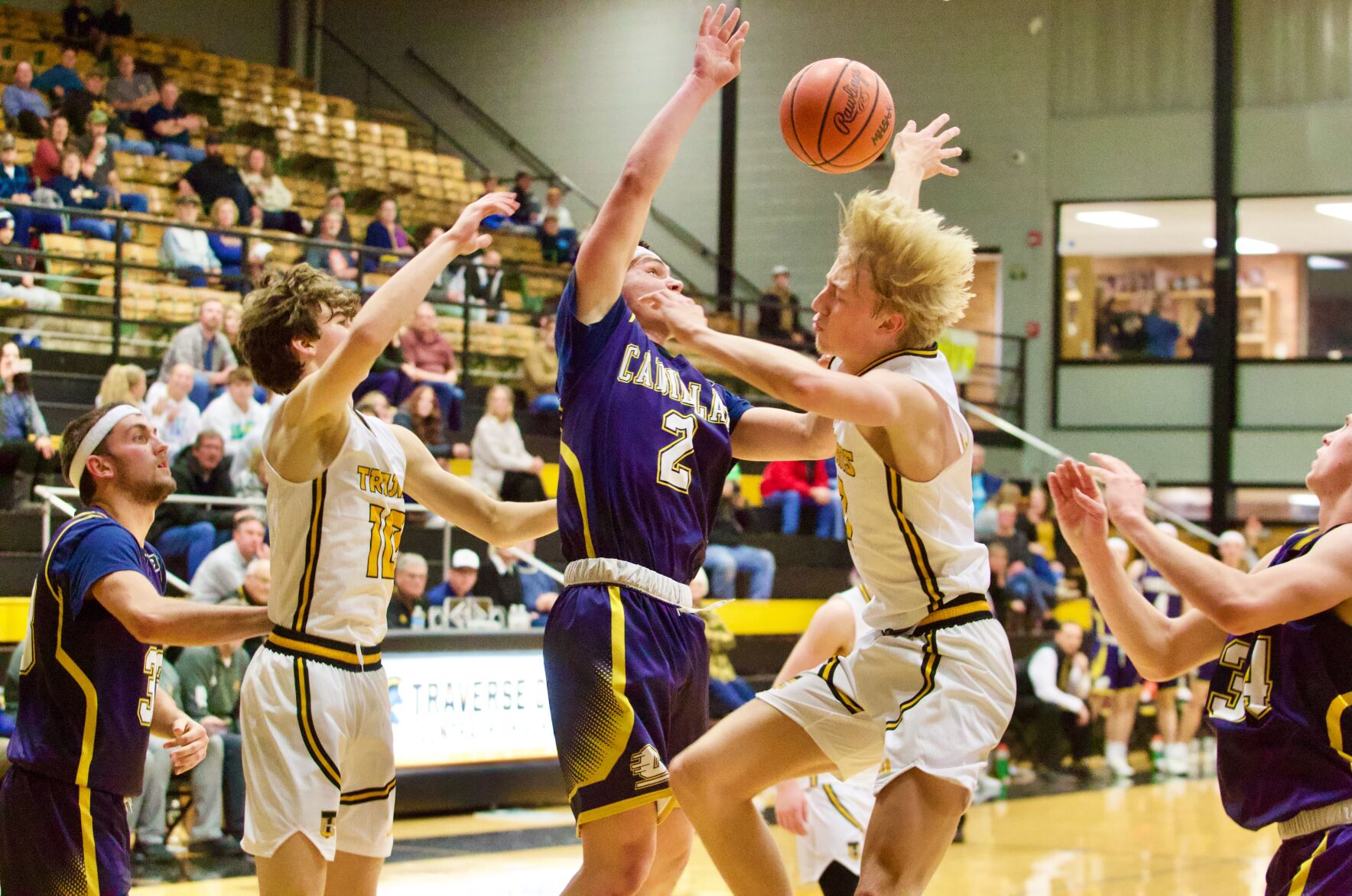 Cadillac dominates Traverse City Central with a 68-33 victory; Charlie Howell scores 25 points