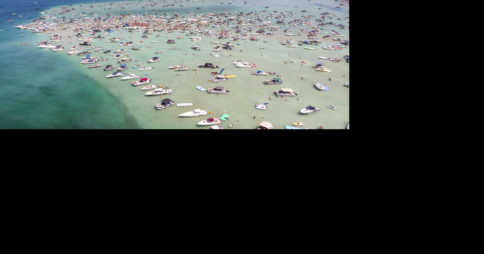 Torch Lake sandbar, Turtle Creek Casino flagged as COVID-19 exposure sites during holiday weekend | Story series | record-eagle.com