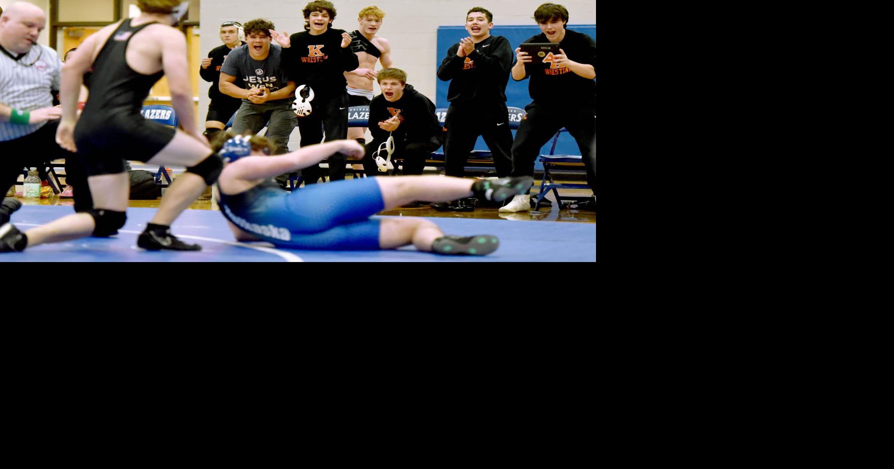 Prep roundup: Frankfort's Reznich earns 400th win; Ribel, Grubb, LaFaive lead West in rout; Kingsley wins wrestling district