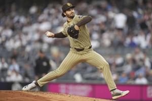 After losing no-hit bid in 7th inning, Padres pitcher Dylan Cease exits with forearm cramp
