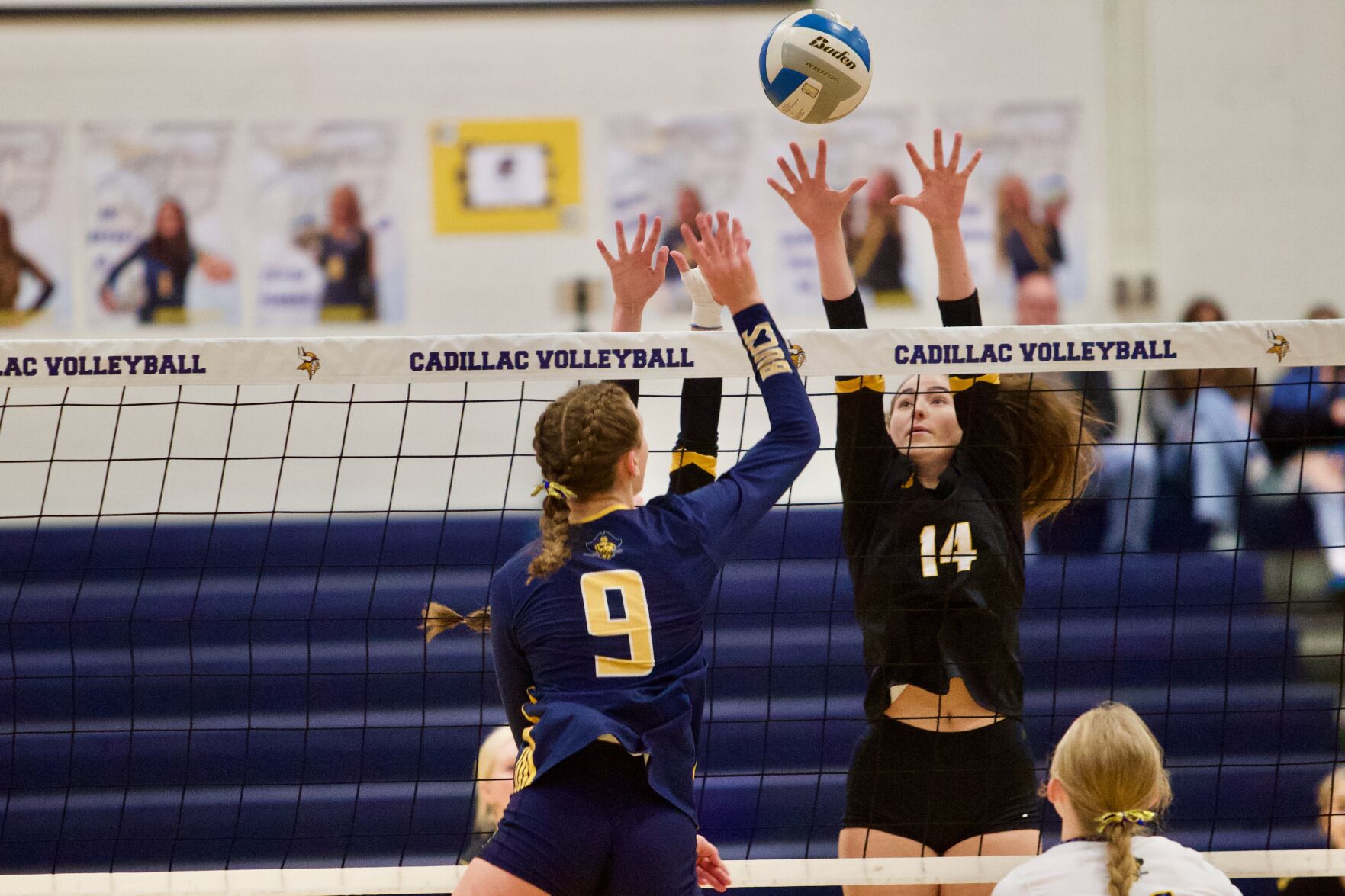 Traverse City Central Trojans put up a tough fight against Grand Haven Buccaneers in Division 1 volleyball regional semifinal