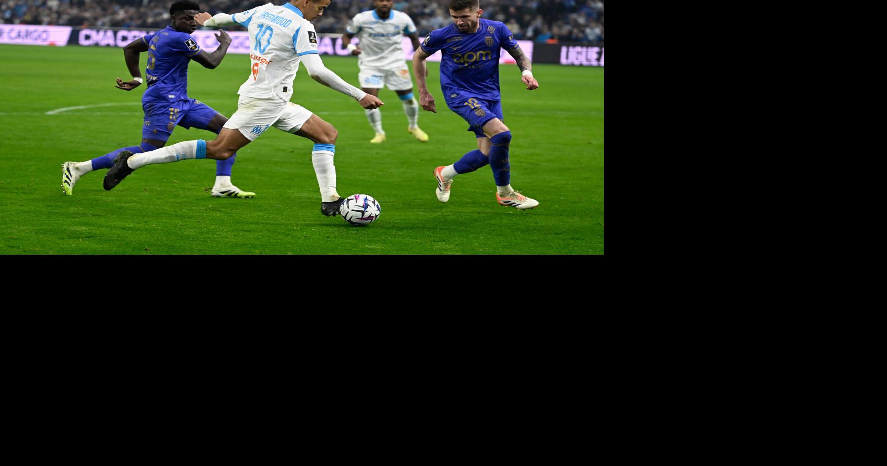 Lens claims Christmas top spot in Ligue 1. Greenwood's late goal helps Marseille beat Monaco