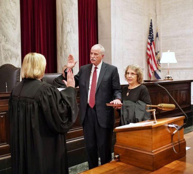 Hutchison Sworn In As Supreme Court Justice News Register Herald Com