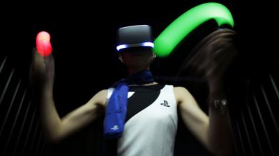 HTC takes on Sony with headset that allows users to roam virtual worlds