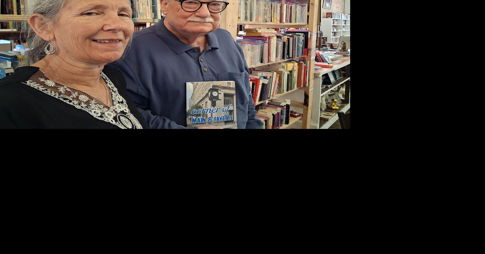Author B.K. Clay autographs copies of his first book at Burm Bookseller's