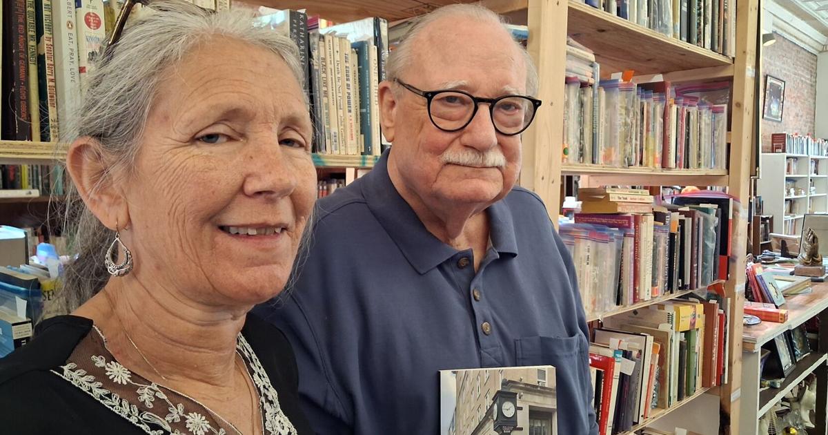 Author B.K. Clay autographs copies of his first book at Burm Bookseller's