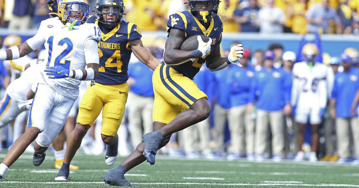 Edwards' short TD run in overtime leads West Virginia over Pittsburgh 31-24 in the Backyard Brawl