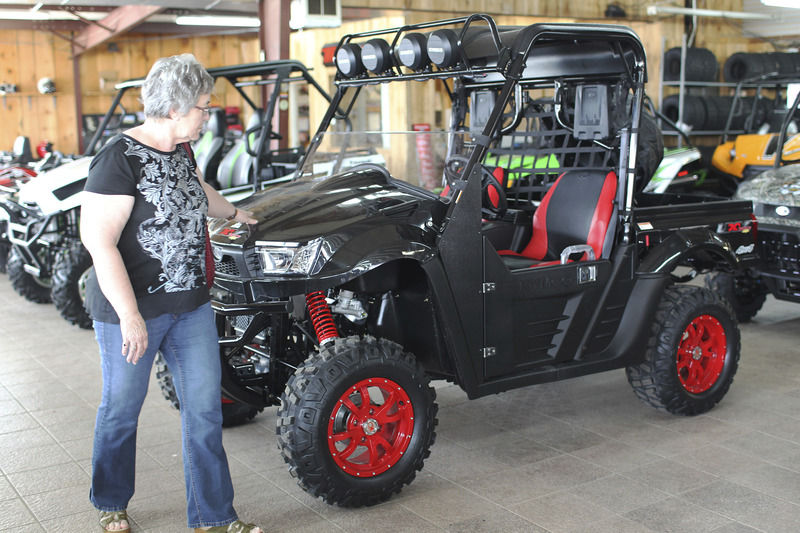 Sidebysides rise up to displace the venerable fourwheeler News