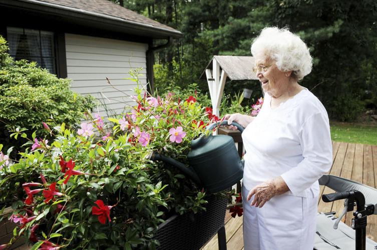 Bayberry Retirement Inn resident flourishes with flower garden