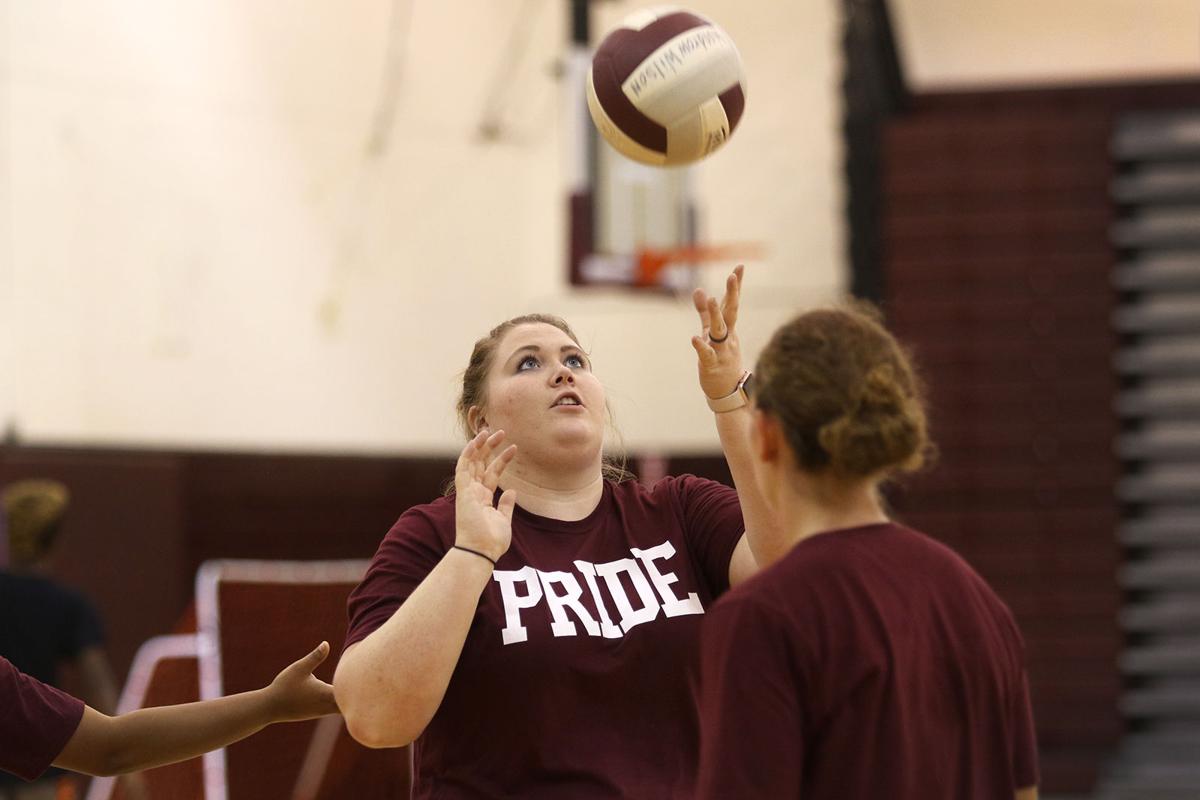 Rhodes takes pride in Woodrow volleyball program Sports register