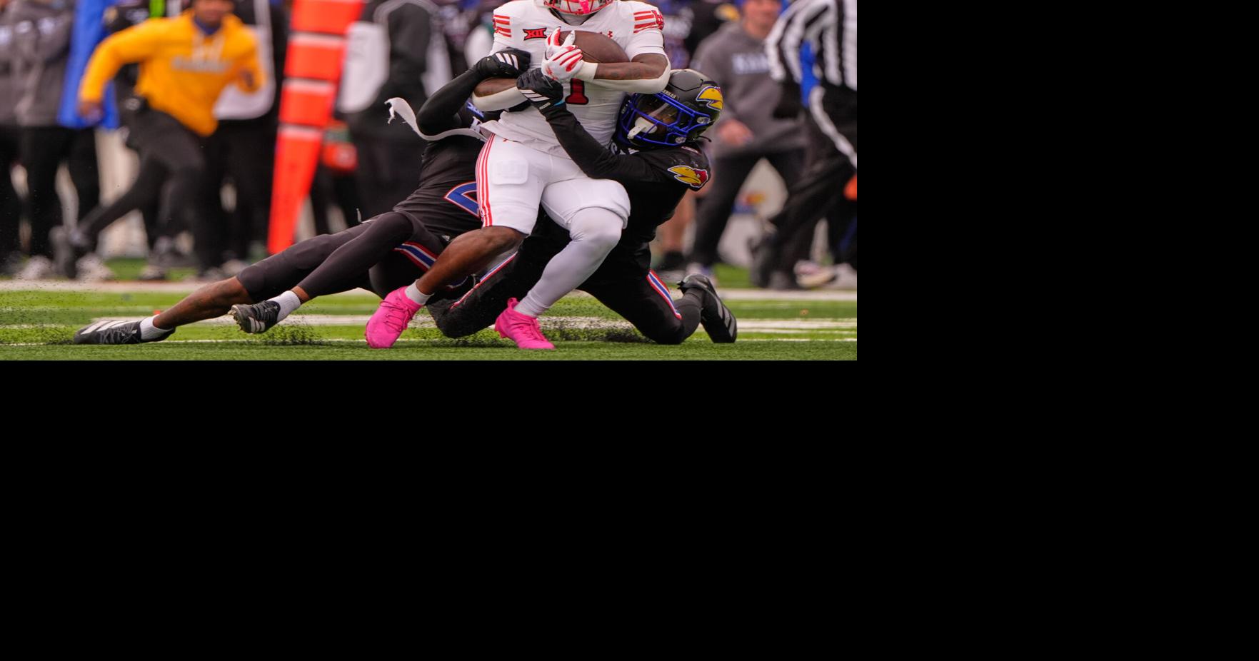 No. 14 Utah rallies to beat Kansas 31-21 and keep its slim Big 12 championship hopes alive