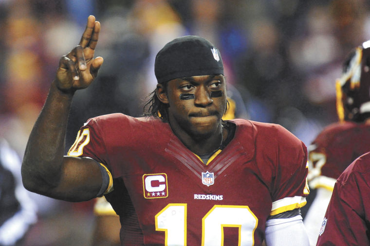 RG3 hurt, Seattle tops Redskins 24-14 in playoffs, Local Sports