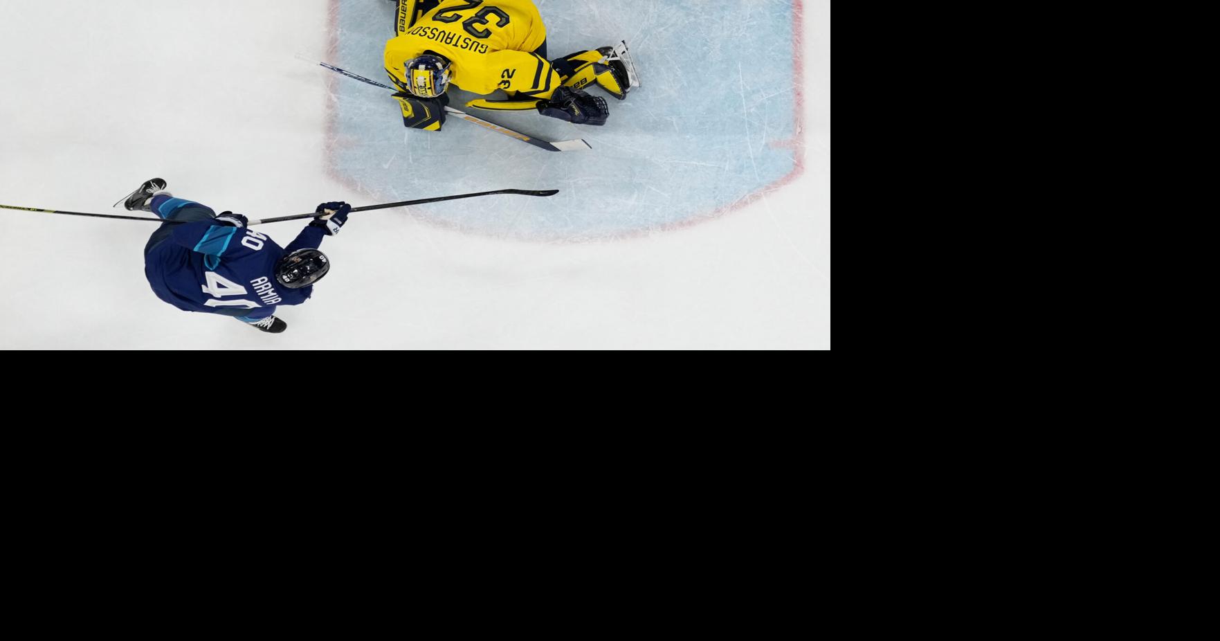 Finland earns feisty win over Sweden at Olympics as McDavid and Crosby score in Canada's victory