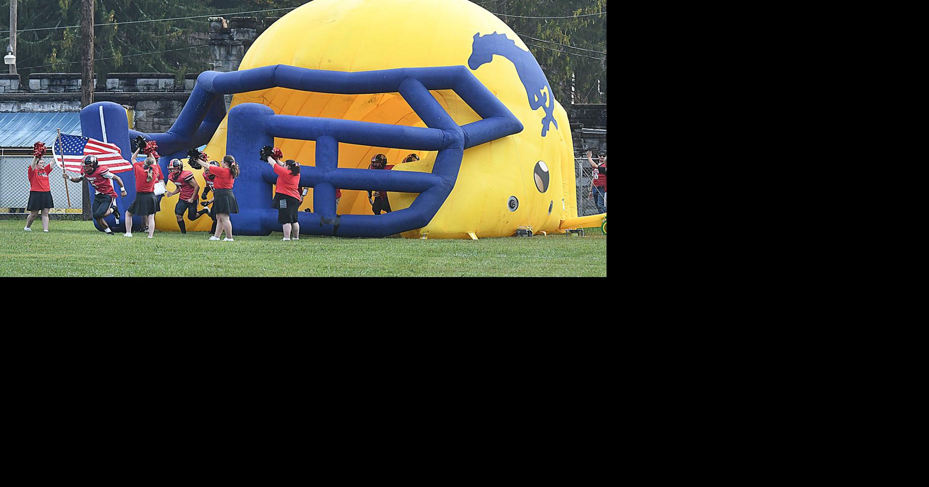 Prep football: Crusaders fall to Lions in historic home opener