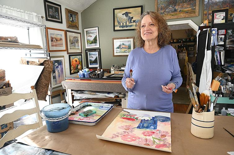 Local artist hangs exhibit at newspaper | Life | register-herald.com