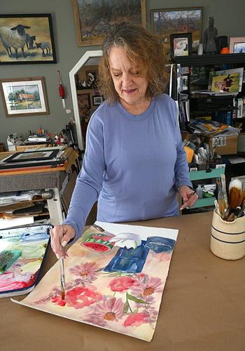 Local artist hangs exhibit at newspaper | Life | register-herald.com