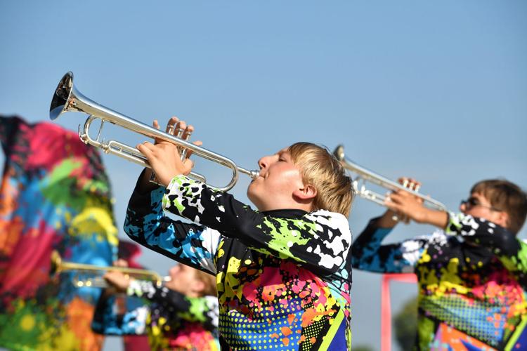 Western Boone Imperial Star Command Band glows at State Fair Band Day