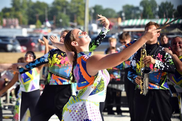 Western Boone Imperial Star Command Band glows at State Fair Band Day