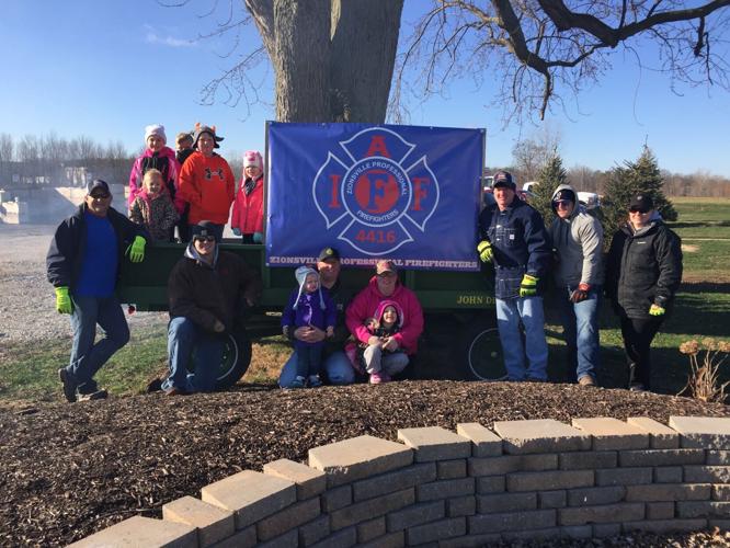 Zionsville nursery and firefighters team up for Christmas tree recycling event