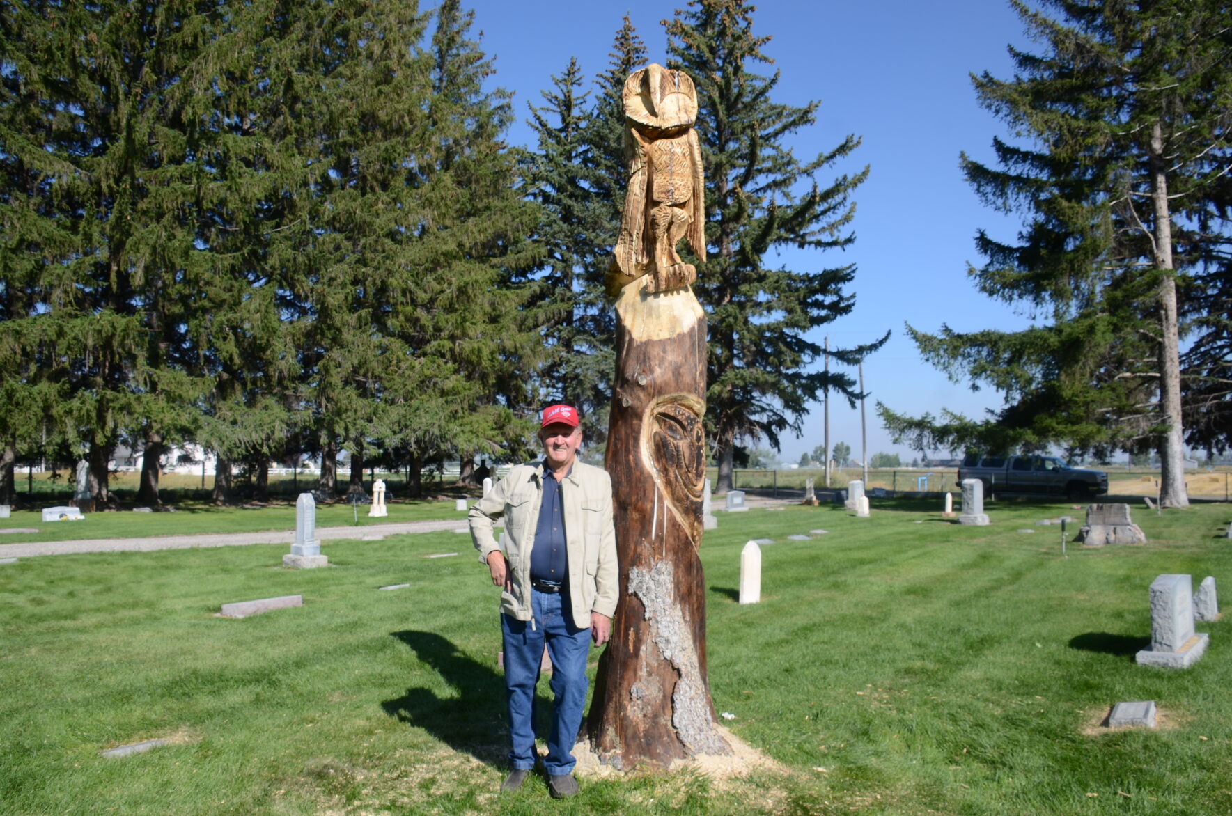 Burton Cemetery tree carving features wildlife