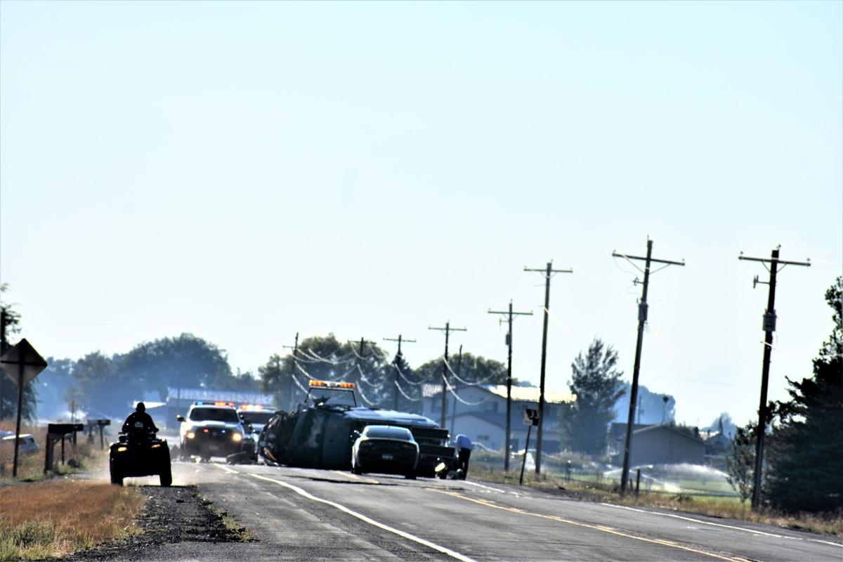 Two car collision causes rollover on Idaho State Highway 33, sends two