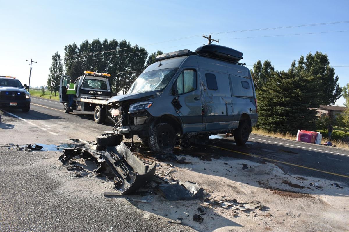 Two car collision causes rollover on Idaho State Highway 33, sends two