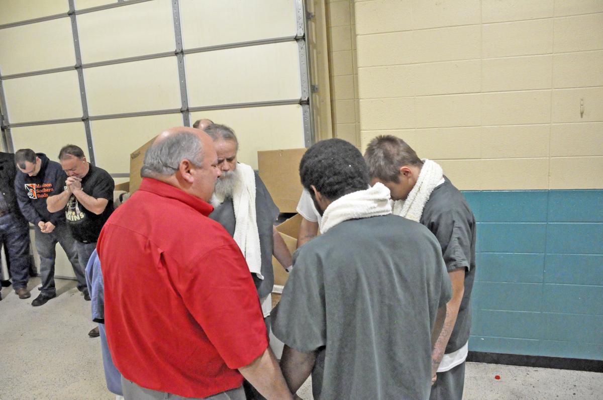 Calmer waters Inmates at Madison County Detention Center baptized