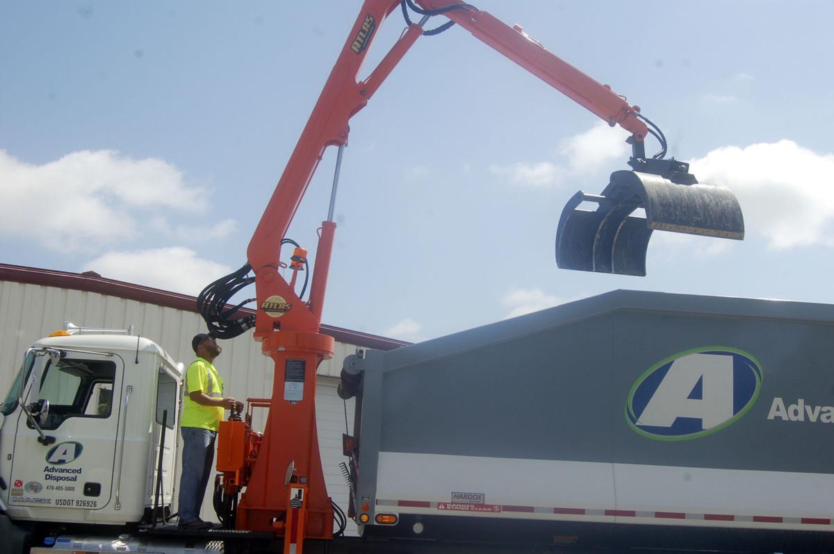Advanced Disposal buys "knuckle boom" truck for use in city News