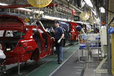 Toyota Investing 1 33 Billion In Georgetown Plant News 18 2010 File Photo Toyota Employee Vince Tharpe Installs Headliners In New Camrys At The Motor Manufacturing Kentucky Plant Georgetown Ky