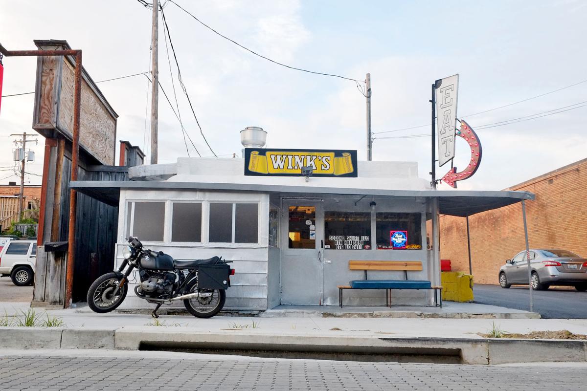 Wink's Warner's travels brought the tiny bar to life Community