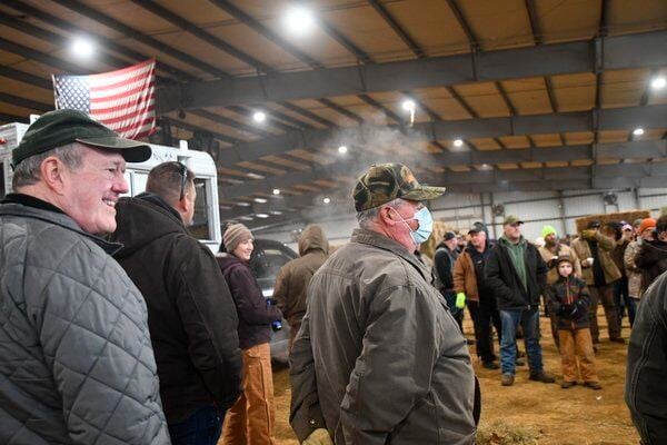 Weathering the weather: Fair board and extension office host annual hay auction