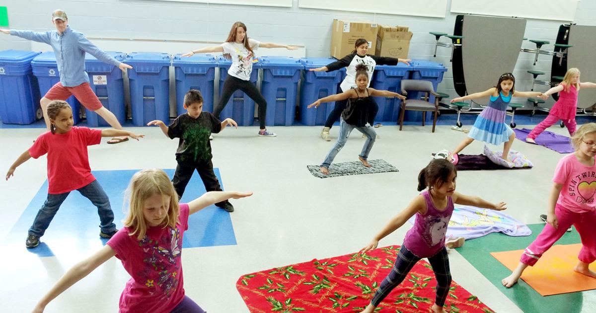 Students learn yoga at YMCA’s spring break camp | Local News ...
