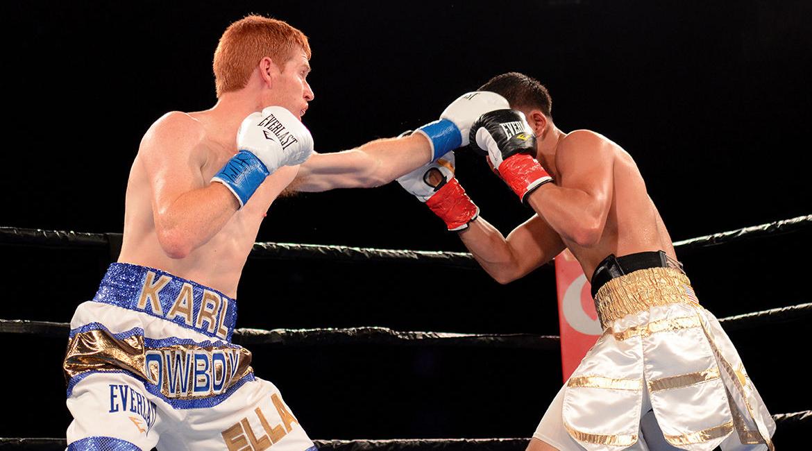 Karl hits Quezada in Face