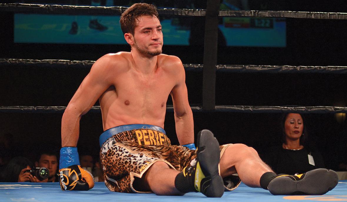 Perrella takes a seat
