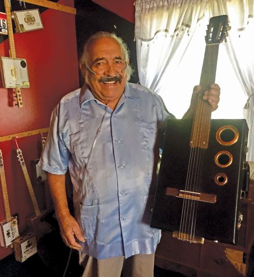 Cipriano Vigil Day at the Office Guitar.jpg