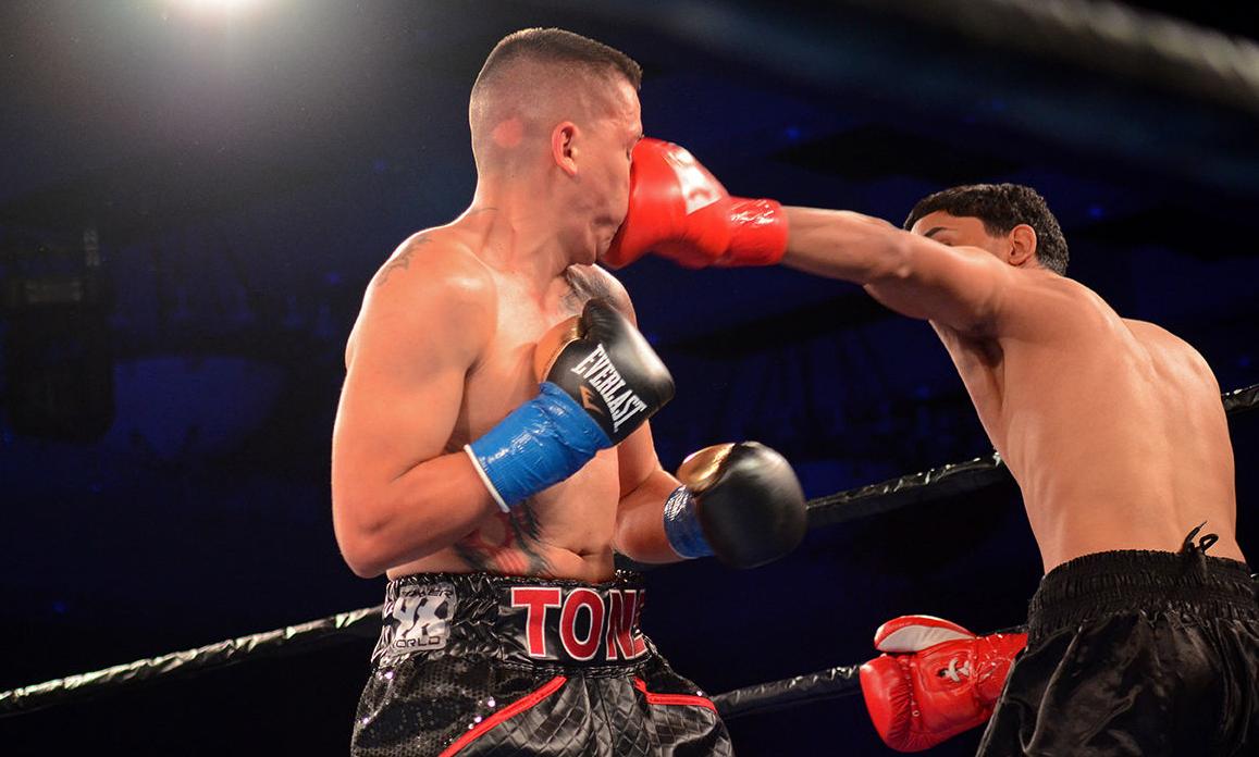 Martinez takes a face punch