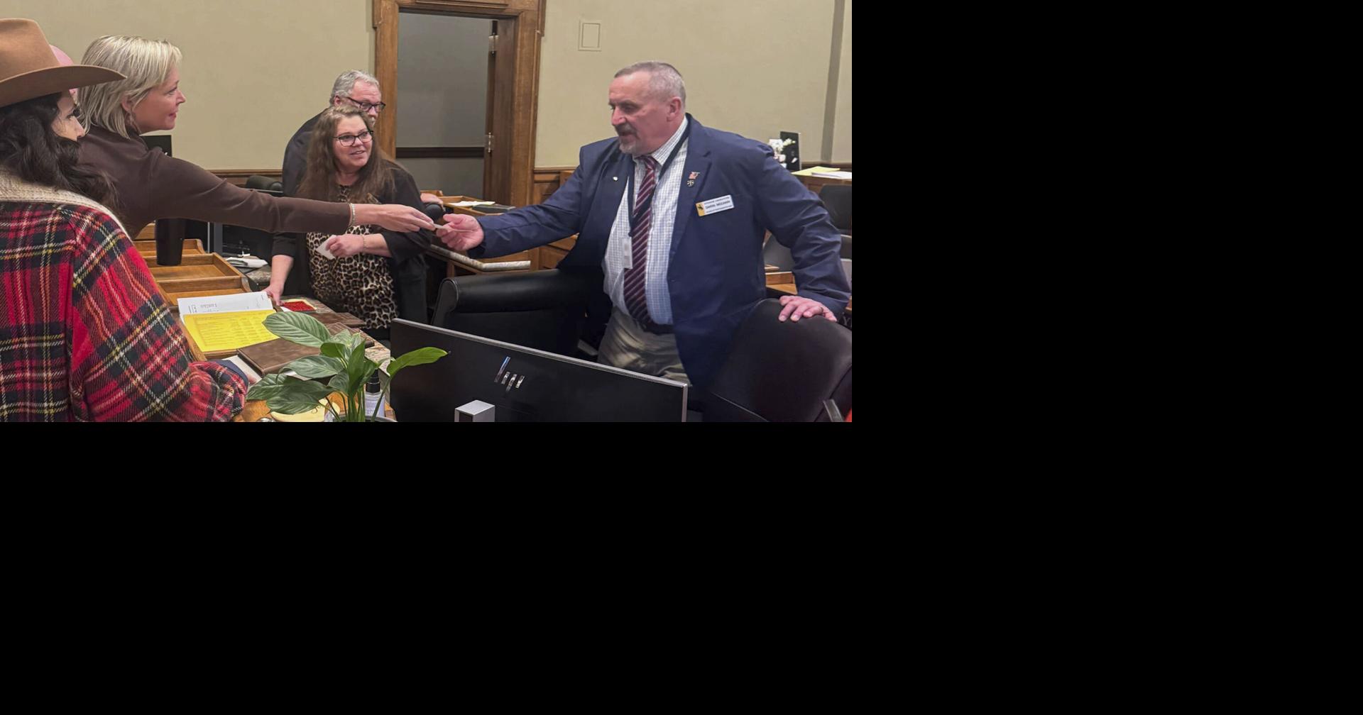 Controversy erupts: Jackson conservative activist hands out checks on House floor