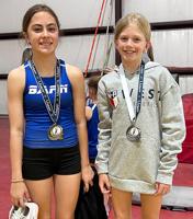 Wilson, Sisk finish top two in junior pole vault tourney
