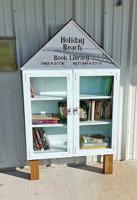 Free library opens in front of HB community center