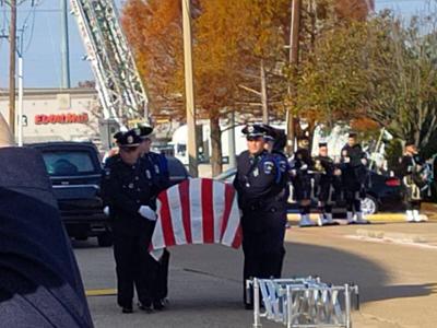 Hundreds attend officer's funeral