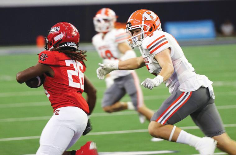 No. 20 Rockwall rolls to 5621 football win over Cedar Hill at The Star