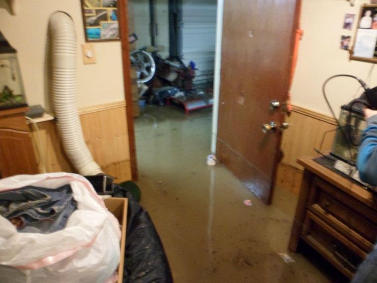 water in bedroom in basement Holbert Road.jpeg