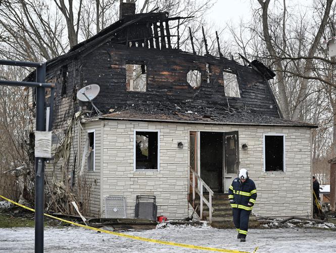 Firefighter suffered minor injury fighting fully involved house fire in